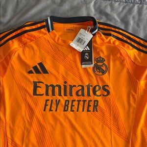 Adidas Vibrant Real Madrid  Orange Soccer Jersey with Black Details
